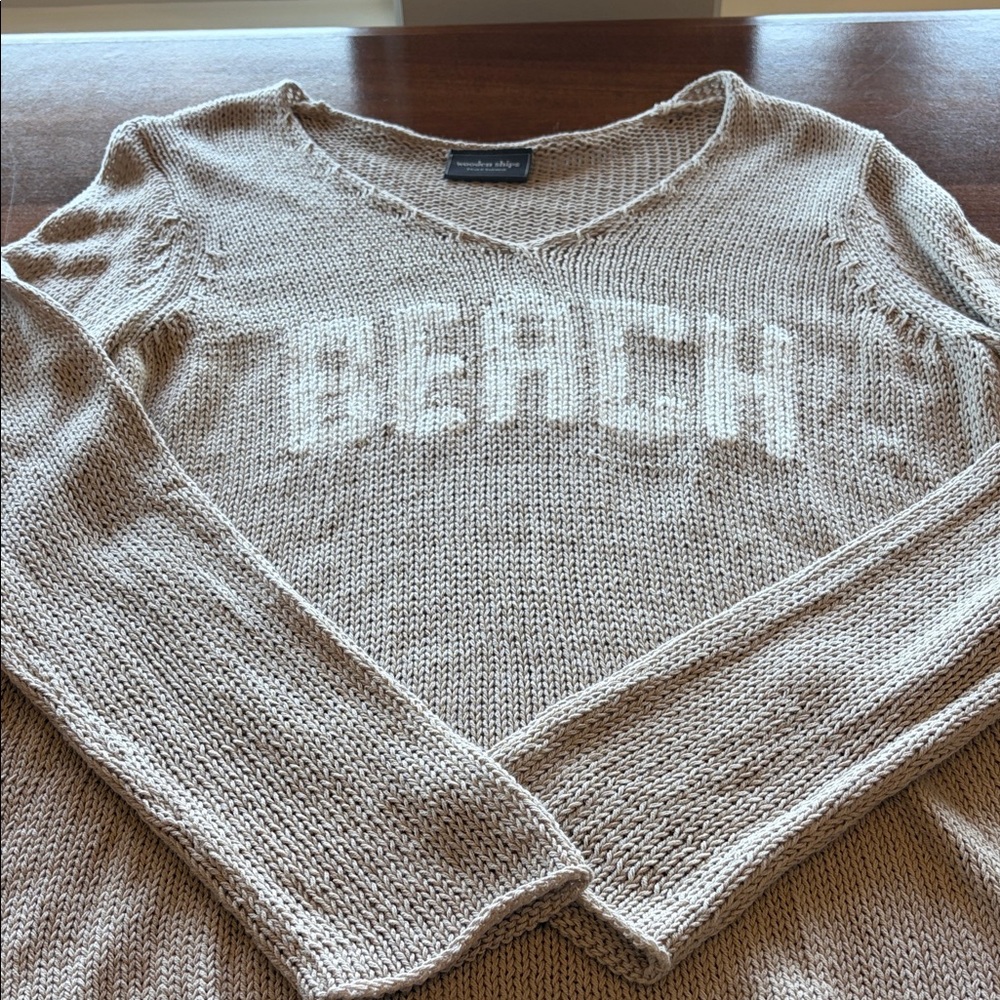 Tan V-Neck Sweater with 'Beach' Design